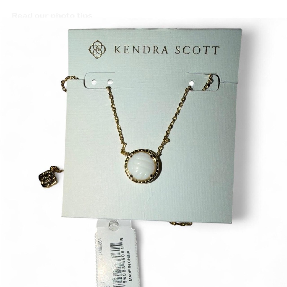 Kendra Scott Gold and White volleyball Pendant Necklace